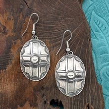 Load image into Gallery viewer, BUFFALO DANCER Taos Pueblo Coin Silver Oval Cross Concho Dangle Earrings