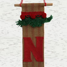Load image into Gallery viewer, 1970s HANDMADE Tan Burlap &amp; Red Felt Noel Banner Green Trim Pom Poms &amp; Tassels
